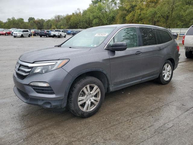 HONDA PILOT LX 2017 with VIN 5FNYF6H15HB083729 - Photo from auction
