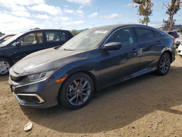HONDA CIVIC EX 2021 with VIN 19XFC1F35ME209093 - Photo from auction