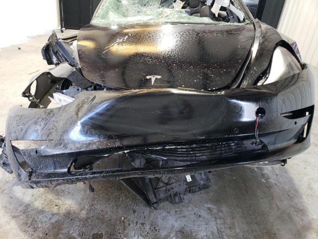 Photo 11 from auction – 2022 TESLA MODEL 3 with VIN 5YJ3E1EB3NF186916