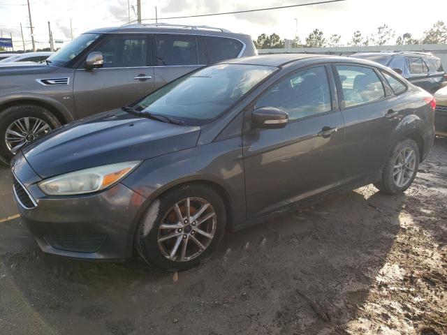 FORD FOCUS SE 2016 with VIN 1FADP3F2XGL393656 - Photo from auction