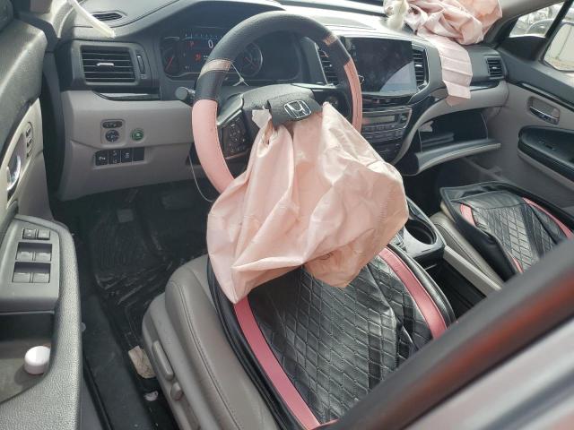 Photo 8 from auction – 2021 HONDA PILOT TOUR with VIN 5FNYF5H92MB033378