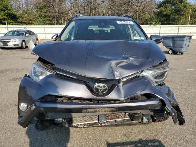 Photo 5 from auction – 2017 TOYOTA RAV4 XLE with VIN JTMRFREV8HJ133237