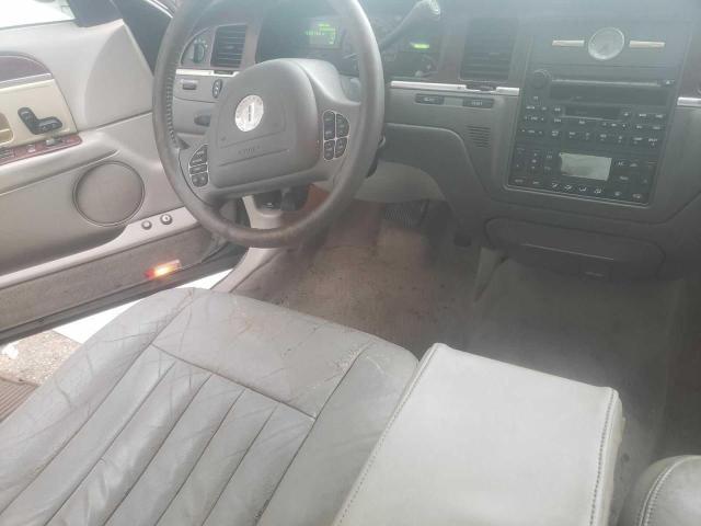 Photo 5 from auction – 2003 LINCOLN TOWN CAR E with VIN 1LNHM81W13Y687189