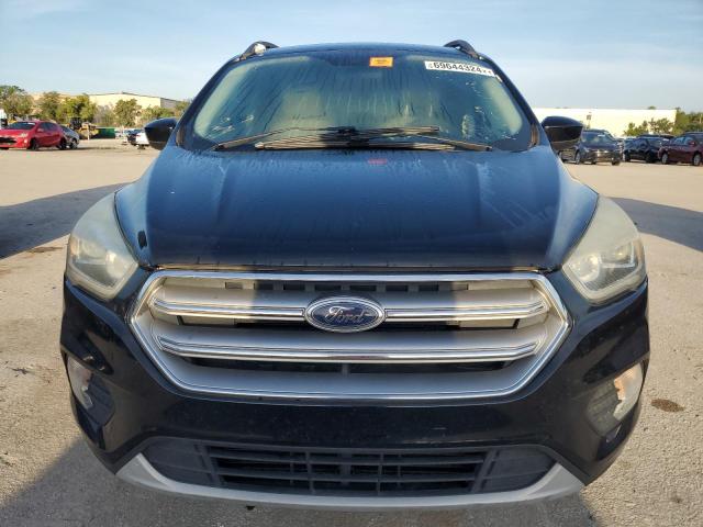 Photo 5 from auction – 2017 FORD ESCAPE SE with VIN 1FMCU9GD9HUC81150