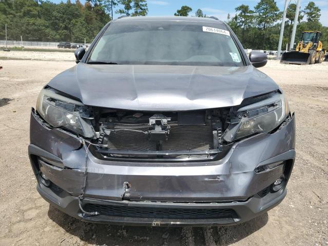 Photo 5 from auction – 2021 HONDA PILOT SE with VIN 5FNYF5H22MB011853