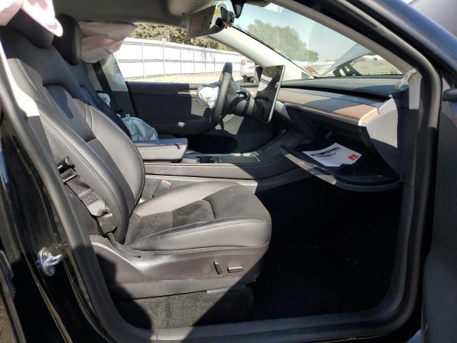 Photo 7 from auction – 2023 TESLA MODEL Y with VIN 7SAYGAEE2PF627225