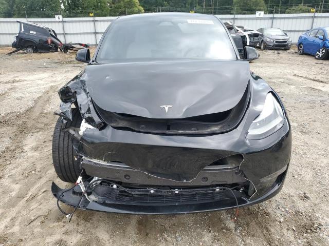 Photo 5 from auction – 2023 TESLA MODEL Y with VIN 7SAYGDEE6PF868934