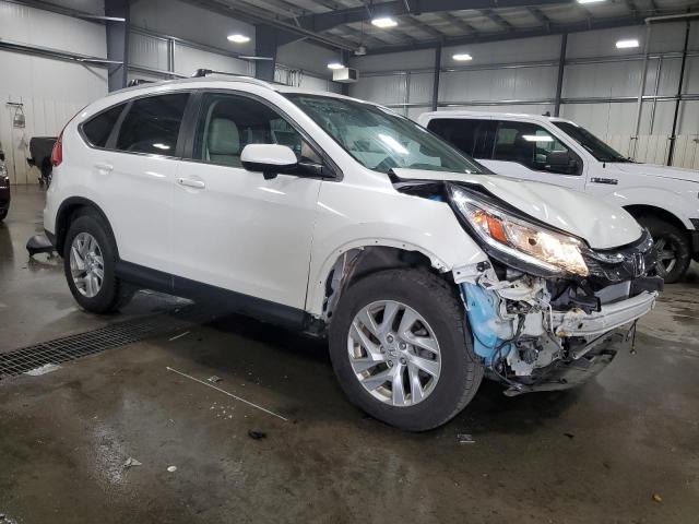 Photo 4 from auction – 2016 HONDA CR-V EXL with VIN 5J6RM4H71GL028056