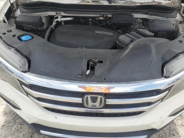 Photo 12 from auction – 2016 HONDA PILOT TOUR with VIN 5FNYF5H96GB013526