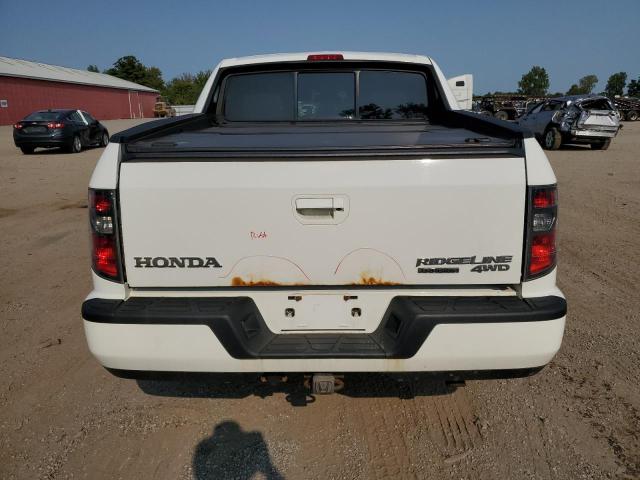Photo 6 from auction – 2014 HONDA RIDGELINE with VIN 5FPYK1F57EB502851