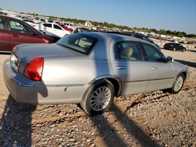 Photo 3 from auction – 2003 LINCOLN TOWN CAR E with VIN 1LNHM81W63Y667147