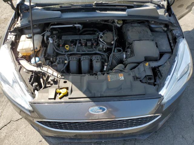 Photo 11 from auction – 2015 FORD FOCUS SE with VIN 1FADP3F28FL203514