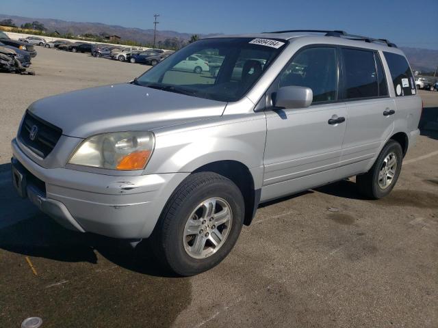 HONDA PILOT EXL 2004 with VIN 2HKYF185X4H593124 - Photo from auction