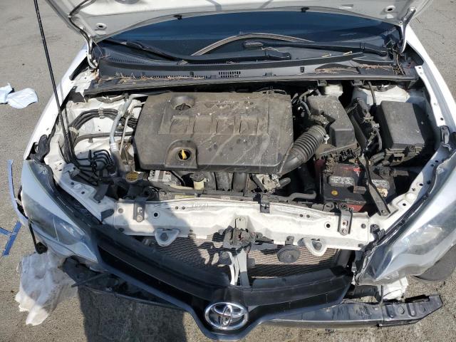 Photo 11 from auction – 2014 TOYOTA COROLLA L with VIN 2T1BURHE7EC198459