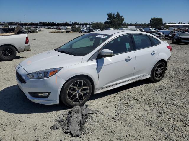 FORD FOCUS SE 2015 with VIN 1FADP3F2XFL380212 - Photo from auction