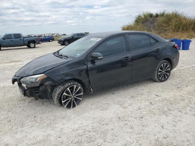 TOYOTA COROLLA L 2017 with VIN 5YFBURHE4HP580145 - Photo from auction
