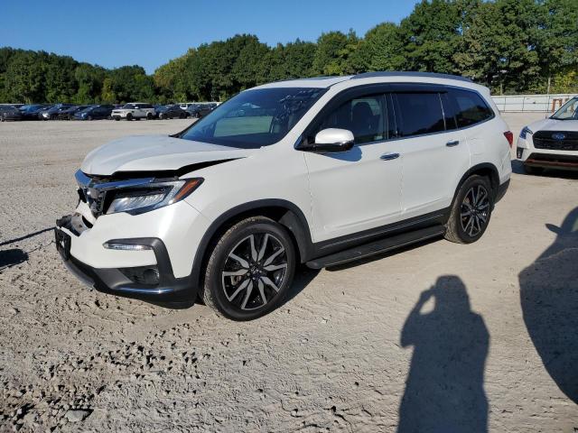 HONDA PILOT TOUR 2020 with VIN 5FNYF6H96LB050141 - Photo from auction
