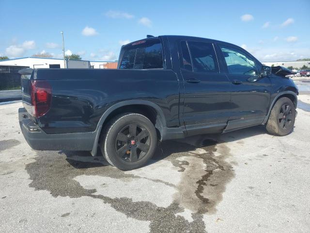 Photo 3 from auction – 2020 HONDA RIDGELINE with VIN 5FPYK3F88LB012406