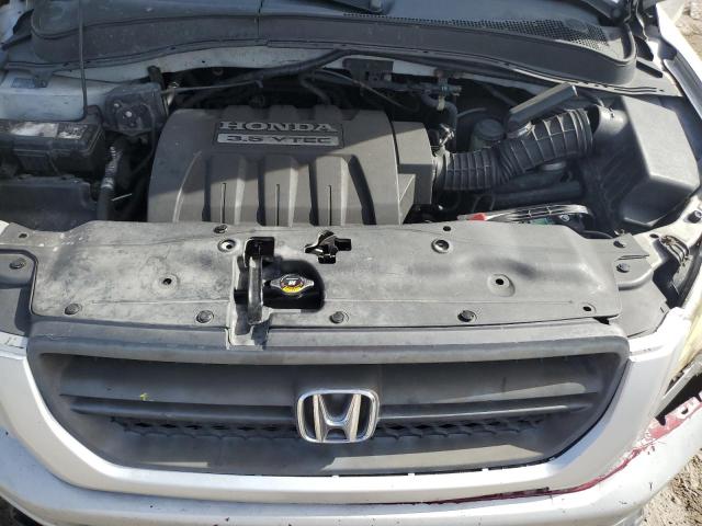Photo 12 from auction – 2005 HONDA PILOT EX with VIN 5FNYF18455B031381