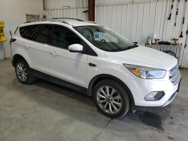Photo 4 from auction – 2018 FORD ESCAPE TIT with VIN 1FMCU9J98JUC07941
