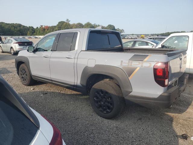 Photo 2 from auction – 2022 HONDA RIDGELINE with VIN 5FPYK3F79NB031718