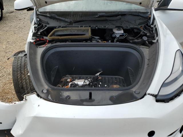 Photo 12 from auction – 2021 TESLA MODEL Y with VIN 5YJYGDED8MF110433