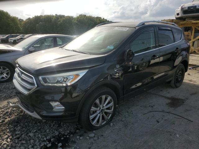 FORD ESCAPE TIT 2017 with VIN 1FMCU9JD7HUC86677 - Photo from auction