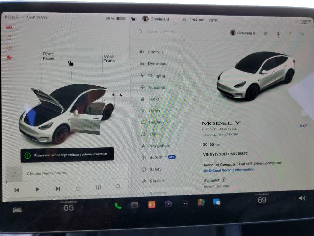 Photo 9 from auction – 2021 TESLA MODEL Y with VIN 5YJYGDEE0MF218697