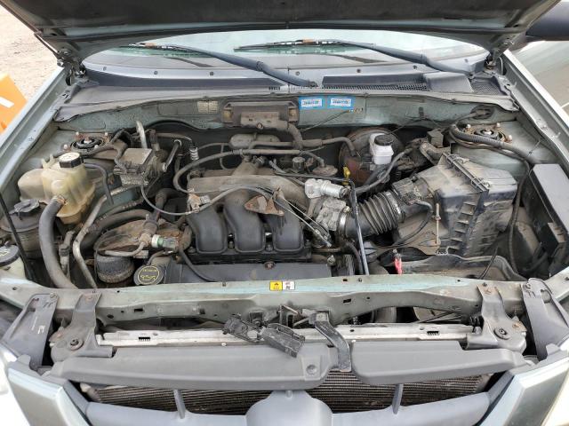 Photo 12 from auction – 2003 MAZDA TRIBUTE LX with VIN 4F2YZ94123KM49852