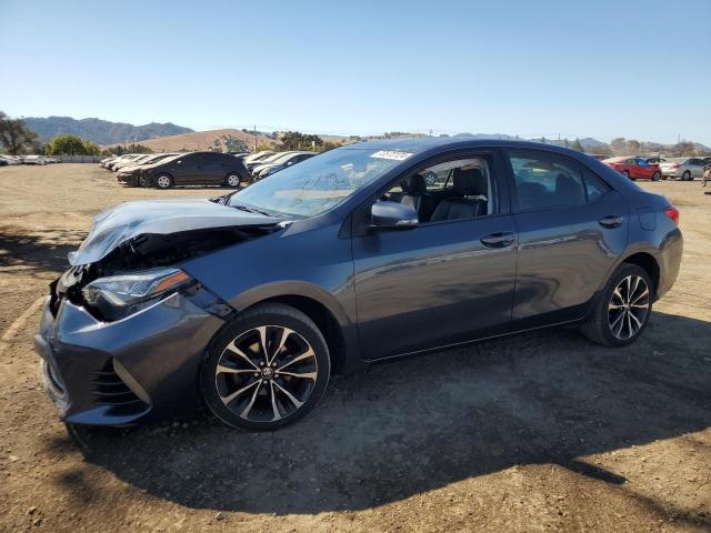 TOYOTA COROLLA L 2017 with VIN 5YFBURHE7HP574002 - Photo from auction