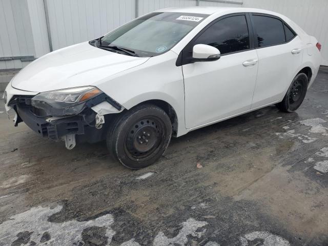 TOYOTA COROLLA L 2017 with VIN 5YFBURHE6HP671448 - Photo from auction