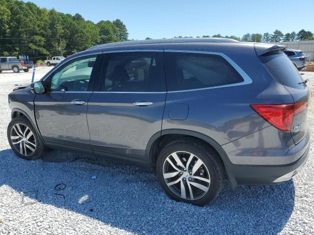 Photo 2 from auction – 2017 HONDA PILOT TOUR with VIN 5FNYF5H96HB036371
