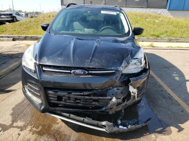 Photo 5 from auction – 2014 FORD ESCAPE SE with VIN 1FMCU9G97EUB35322