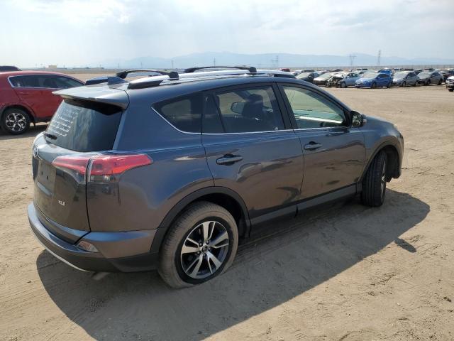 Photo 3 from auction – 2016 TOYOTA RAV4 XLE with VIN JTMWFREV4GJ097709