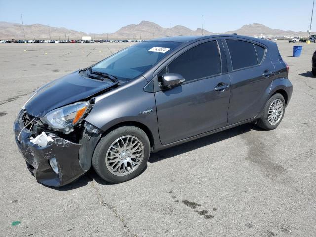 TOYOTA PRIUS C 2015 with VIN JTDKDTB38F1099434 - Photo from auction