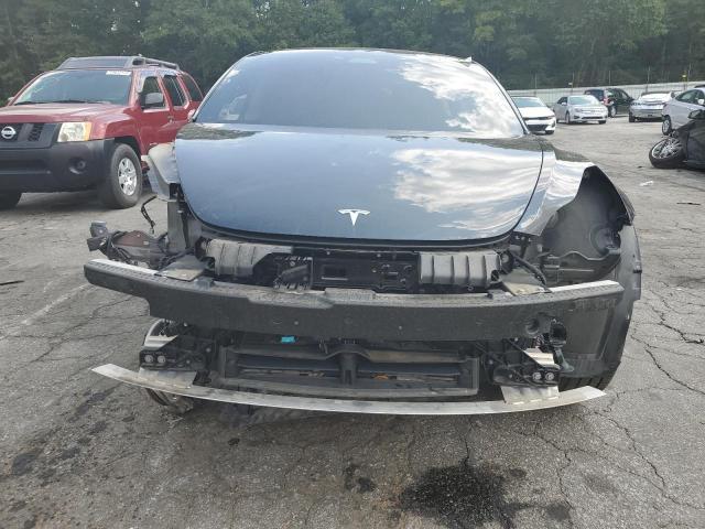 Photo 5 from auction – 2021 TESLA MODEL 3 with VIN 5YJ3E1EA1MF996017