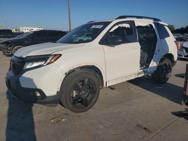 HONDA PASSPORT E 2021 with VIN 5FNYF8H04MB014544 - Photo from auction