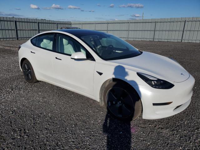 Photo 4 from auction – 2021 TESLA MODEL 3 with VIN 5YJ3E1EA5MF018748