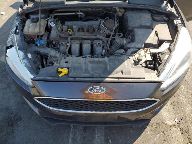 Photo 11 from auction – 2016 FORD FOCUS SE with VIN 1FADP3F28GL278814