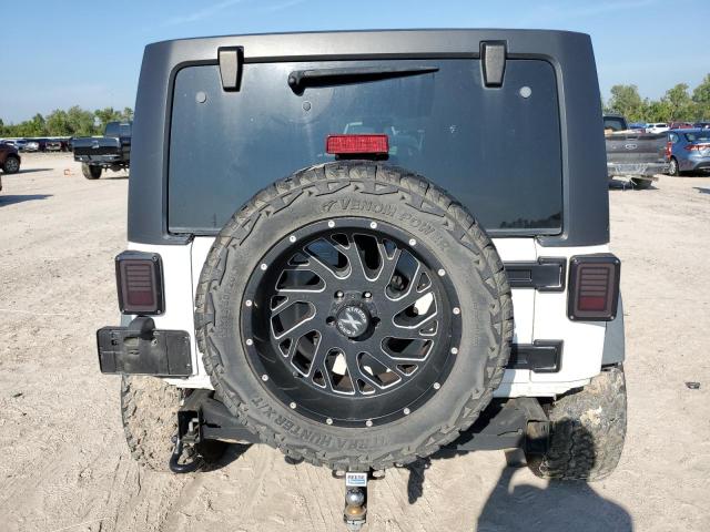 Photo 6 from auction – 2015 JEEP WRANGLER U with VIN 1C4BJWDG2FL628679