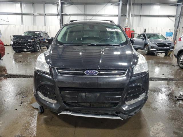 Photo 5 from auction – 2015 FORD ESCAPE TIT with VIN 1FMCU9J92FUC63154
