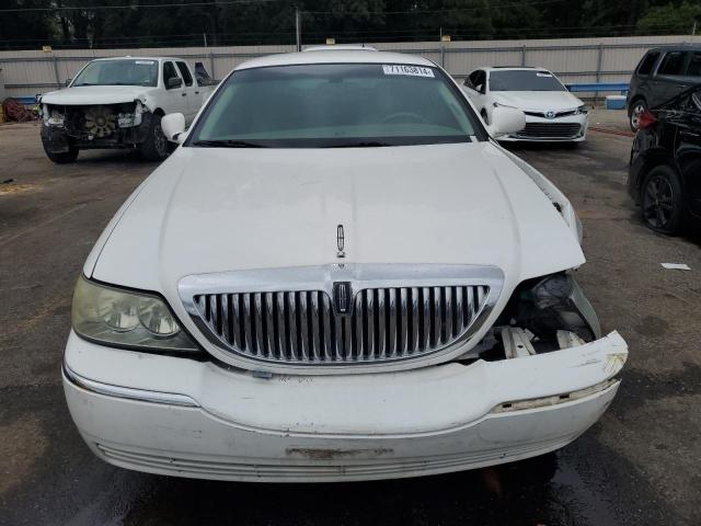 Photo 5 from auction – 2004 LINCOLN TOWN CAR E with VIN 1LNHM81W44Y617686