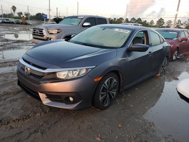 Photo 1 from auction – 2016 HONDA CIVIC EX with VIN 19XFC1F32GE040185