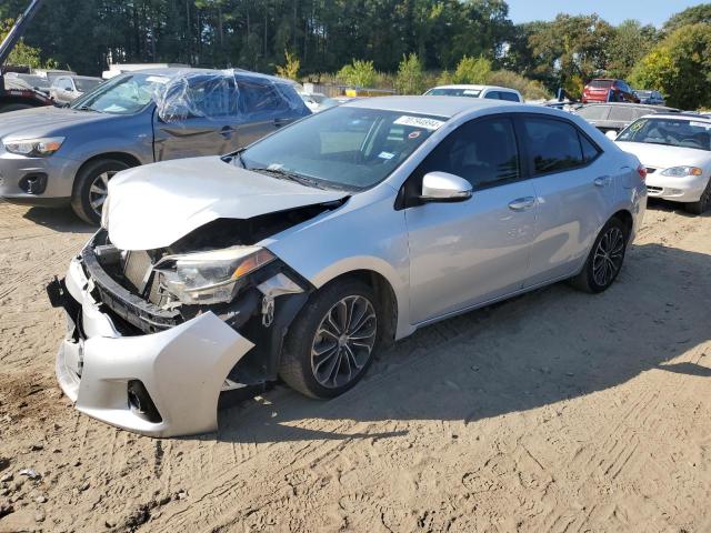 TOYOTA COROLLA L 2014 with VIN 5YFBURHE8EP111149 - Photo from auction