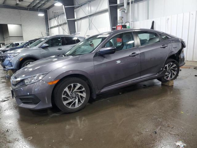 HONDA CIVIC EX 2018 with VIN 19XFC2F78JE022368 - Photo from auction