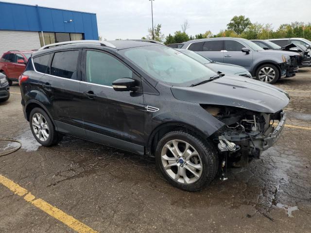 Photo 4 from auction – 2015 FORD ESCAPE TIT with VIN 1FMCU0JX0FUC34956