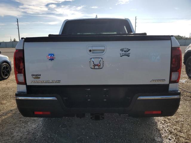 Photo 6 from auction – 2018 HONDA RIDGELINE with VIN 5FPYK3F68JB007783