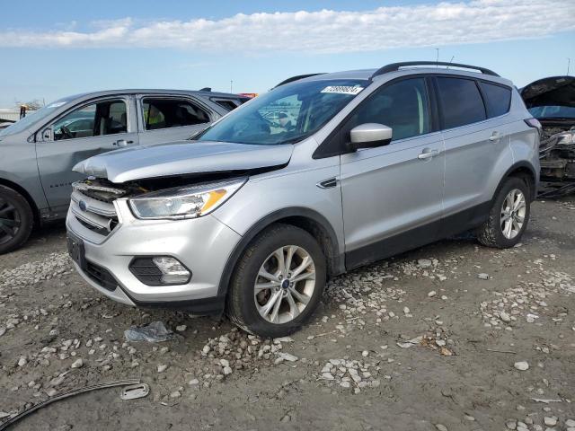 FORD ESCAPE SE 2018 with VIN 1FMCU9GD4JUC37501 - Photo from auction
