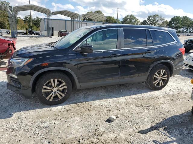 HONDA PILOT EXL 2017 with VIN 5FNYF5H52HB022755 - Photo from auction