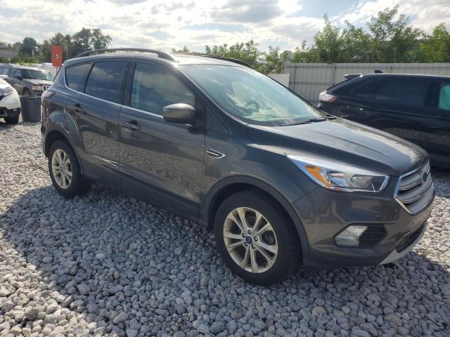 Photo 4 from auction – 2018 FORD ESCAPE SE with VIN 1FMCU0GD3JUC61090
